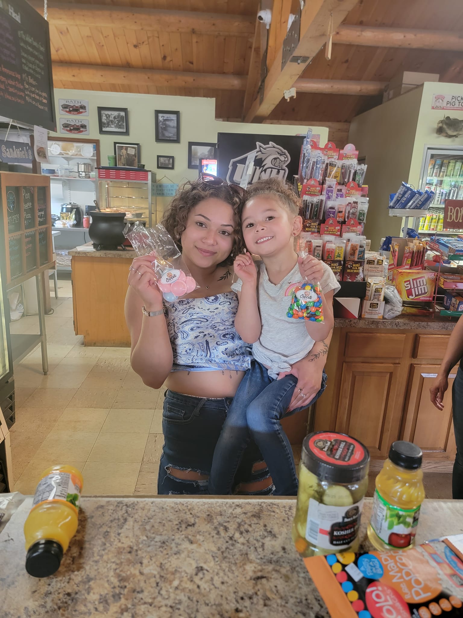 Mom and daughter behind the counter at Swiftwater Way Station